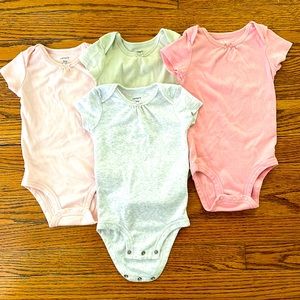 Carter’s short sleeved onesies, four pack, size 9 months